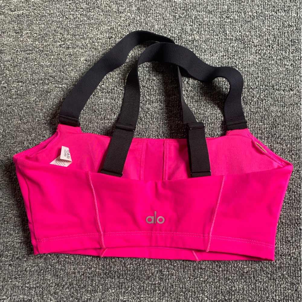Alo Yoga bright pink sport bra.